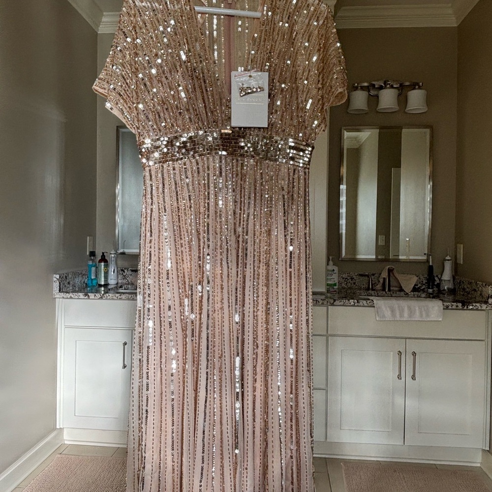 Mac Duggal Sequin full length gown. Bralette insert with adjustable straps. Line